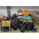 A QUANTITY OF MODERN CAMERAS AND ACCESSORIES (QTY)
