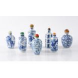 A GROUP OF SEVEN CHINESE PORCELAIN BLUE AND WHITE SNUFF BOTTLES (7)