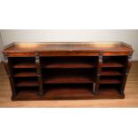AN EARLY VICTORIAN ROSEWOOD OPEN BOOKCASE WITH THREE-QUARTER PIERCED BRASS GALLERY