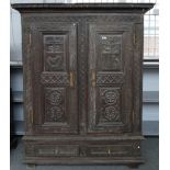 A 18TH CENTURY FRENCH CARVED OAK TWO DOOR ARMOIRE