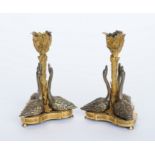 A PAIR OF GILT-BRONZE SWAN CANDLESTICKS (2)