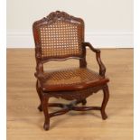 A MINIATURE 18TH CENTURY FRENCH STYLE WALNUT OPEN ARMCHAIR