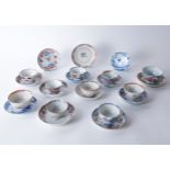 A GROUP OF TEN CHINESE PORCELAIN TEABOWLS AND THIRTEEN SAUCERS (23)
