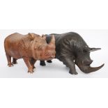 A BRONZE MODEL OF A RHINOCEROS, TOGETHER WITH ANOTHER COMPOSITE EXAMPLE (2)