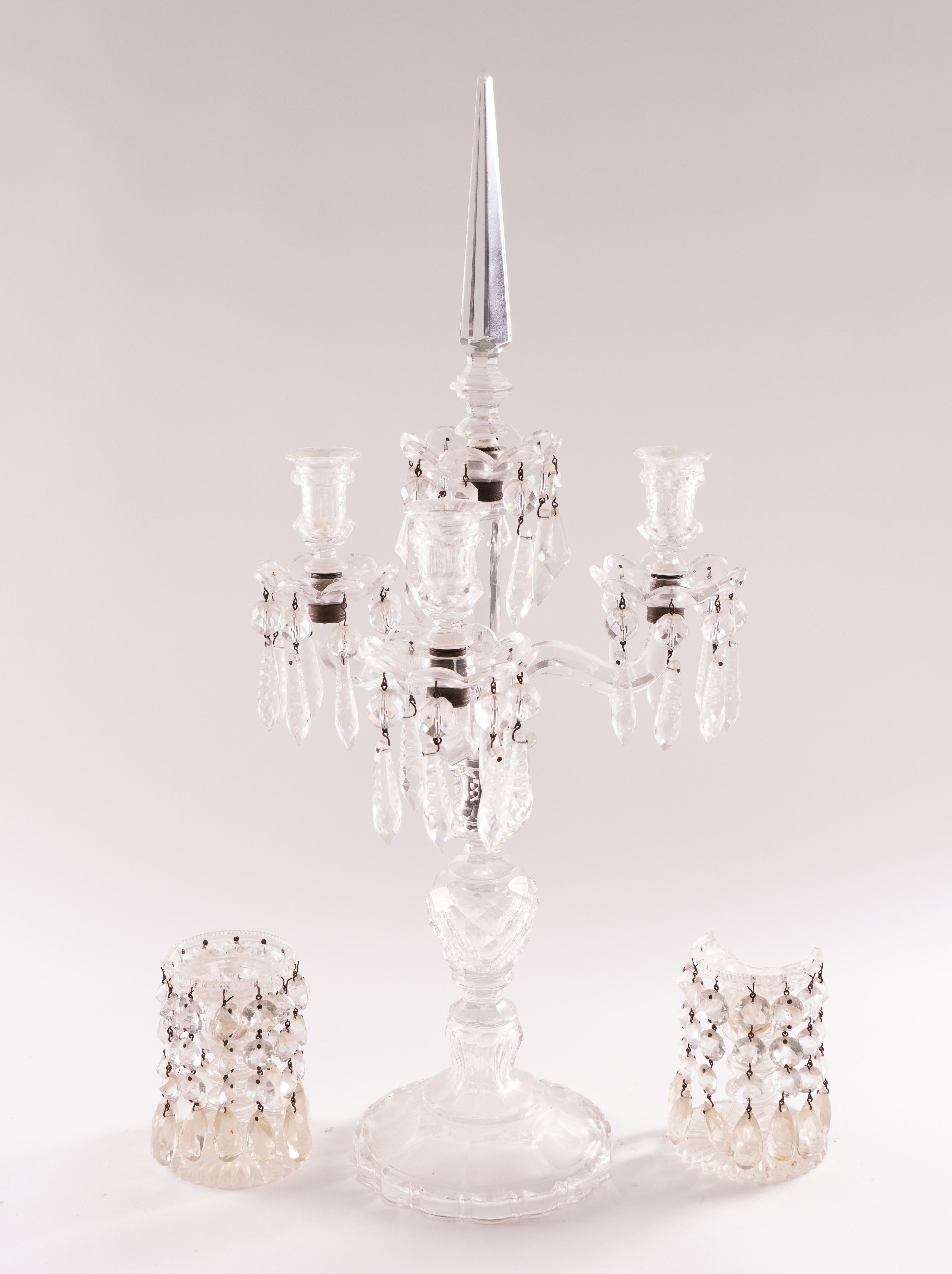 A VICTORIAN GLASS LUSTRE THREE LIGHT CANDELABRUM AND A PAIR OF CANDLESTICKS (3)
