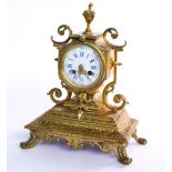 A FRENCH GILT-METAL MOUNTED MANTEL CLOCK