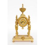 VASSY JEURE, PARIS: AN EMPIRE STYLE ORMOLU PORTICO MANTEL CLOCK