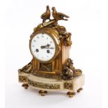 A FRENCH LOUIS XVI STYLE GILT-METAL MARBLE MOUNTED MANTEL CLOCK