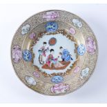 A CHINESE EXPORT FAMILLE-ROSE SOUP PLATE