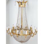 A FRENCH EMPIRE REVIVAL ORMOLU AND CUT GLASS TWELVE-LIGHT CHANDELIER