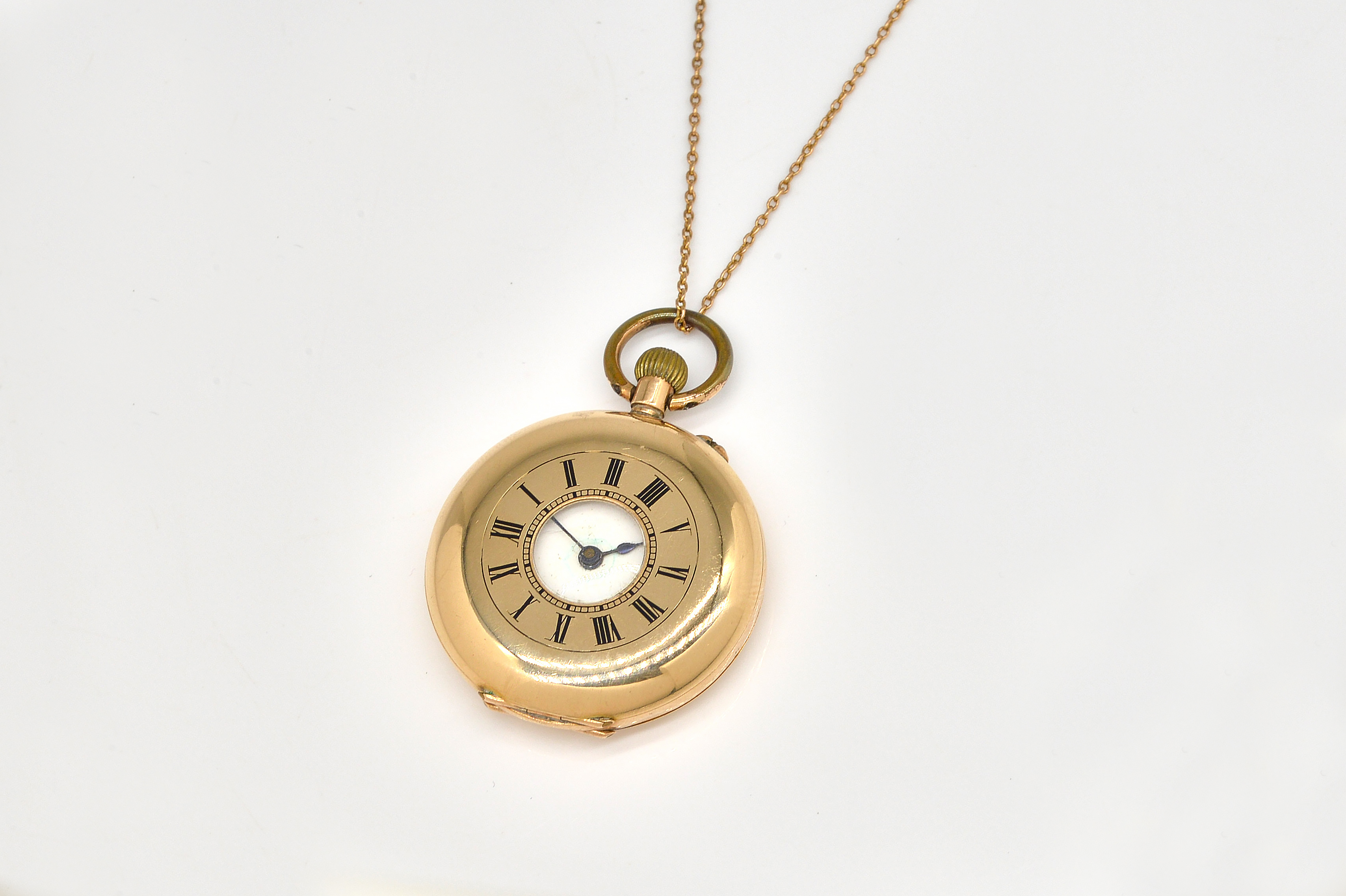 A LADY'S GOLD HALF HUNTING CASED FOB WATCH AND A GOLD NECKCHAIN (2)