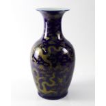 A CHINESE BLUE-GROUND BALUSTER VASE