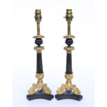 A PAIR OF RESTAURATION STYLE GILT AND BRONZE PATINATED METAL TABLE LAMPS (2)