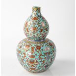 A CHINESE FAMILLE-ROSE TURQUOISE-GROUND DOUBLE GOURD VASE