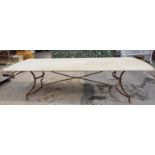 A LARGE STONE TOPPED ROUNDED RECTANGULAR TABLE