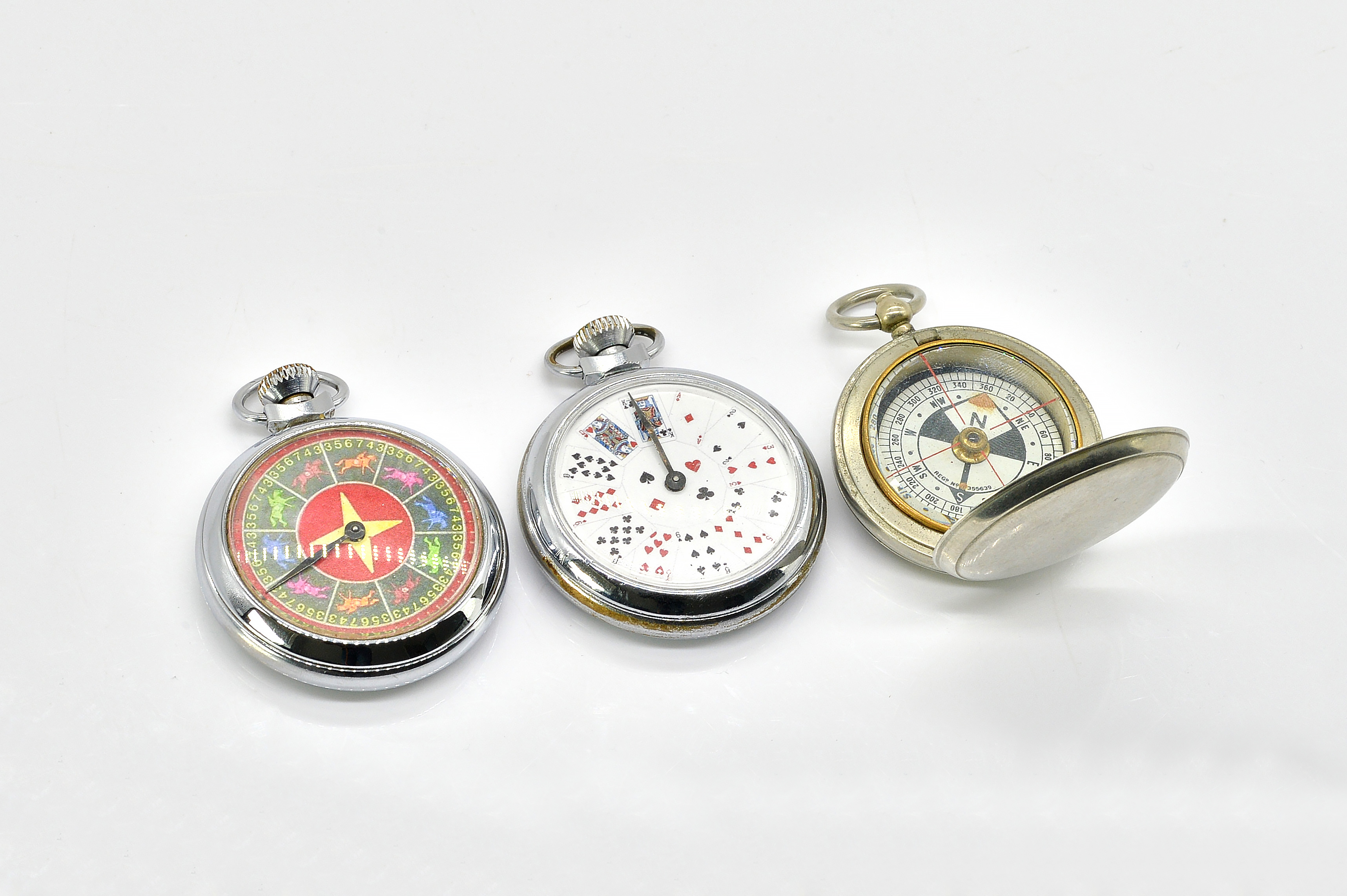 TWO KEYLESS WIND STEEL GAMES WATCHES AND A COMPASS (3)