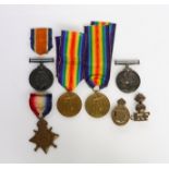 A GROUP OF THREE FIRST WORLD WAR MEDALS, TWO FURTHER MEDALS AND TWO BADGES (7)