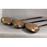 A GROUP OF THREE 19TH CENTURY AND LATER COPPER BED PANS (3)