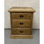 AN EARLY 20TH CENTURY PINE BEDSIDE CHEST