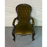 A VICTORIAN CARVED MAHOGANY FRAMED SPOONBACK OPEN ARMCHAIR