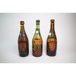 THREE MODERN GREEN GLASS WINE BOTTLES PAINTED WITH ‘BITTER’ ‘BRANDY’ AND ‘GIN’, (3)