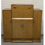 WITHDRAWN A MID 20TH CENTURY BIRD’S EYE MAPLE DRINKS CABINET