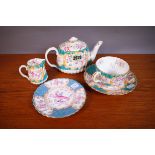 A BLUE AND FLORAL MINTON TEA SET FOR ONE PERSON