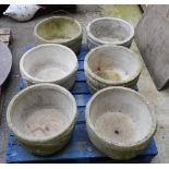 A SET OF SIX MODERN RECONSTITUTED STONE CIRCULAR PLANTERS (6)