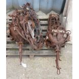 A PAIR OF WROUGHT IRON OUTDOOR LAMPS (4)