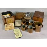 TWO MAHOGANY SLIDE BOXES AND ANOTHER WITH INLAY; TOGETHER WITH FIVE COPPER GRAIN TANKARDS AND...
