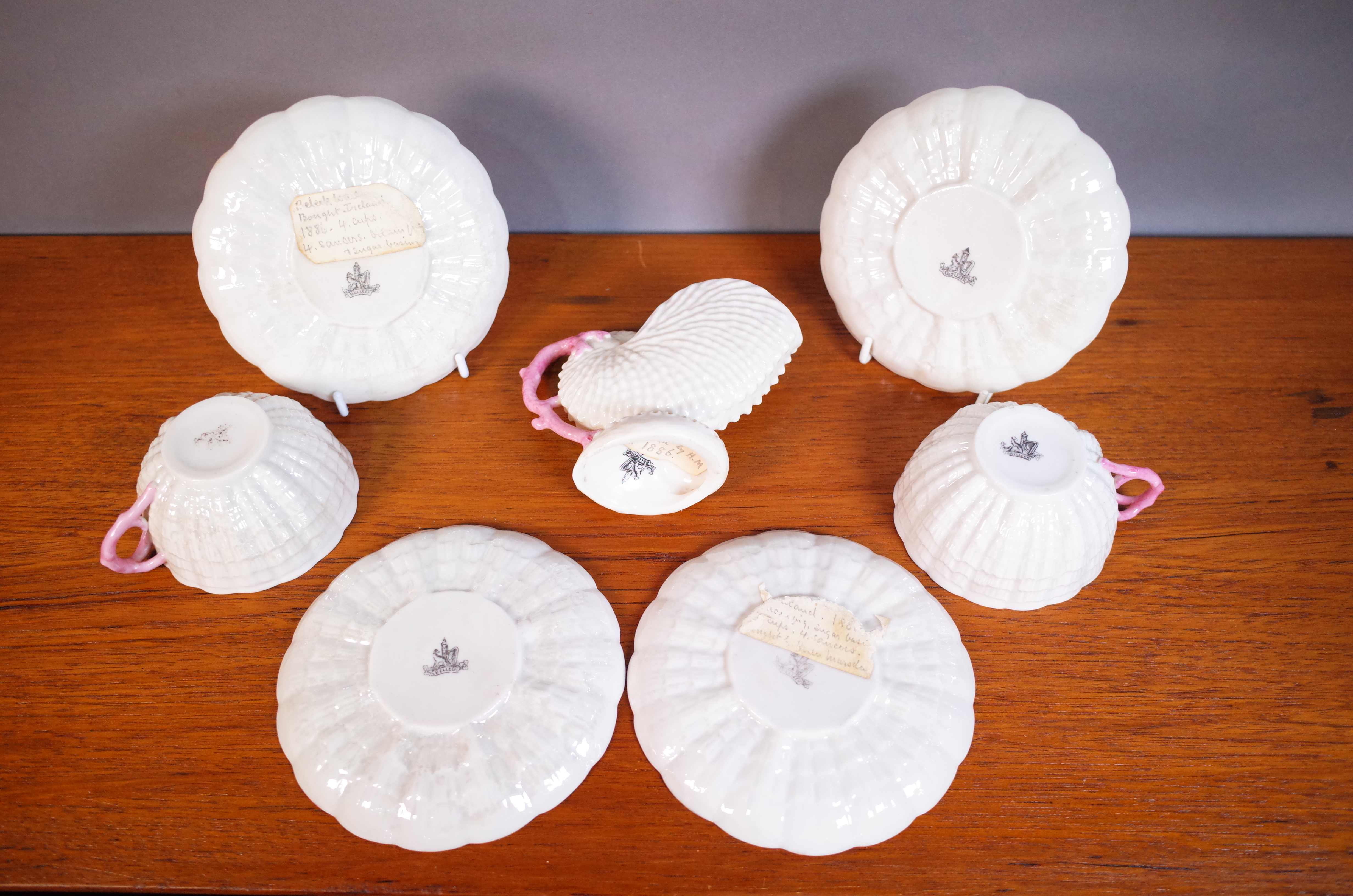 CERAMICS, A GROUP OF BELEEK INCLUDING, FOUR SAUCERS, A SHELL JUG AND TWO CUPS (7) - Image 2 of 2