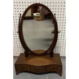 A MAHOGANY TOILET MIRROR WITH SERPENTINE THREE DRAWER BASE