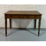 A 19TH CENTURY MAHOGANY TWO DRAWER WRITING TABLE