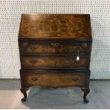 A GEORGE II STYLE WALNUT BUREAU