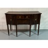 A SMALL REGENCY MAHOGANY BOWFRONT SIDEBOARD