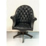 A MODERN BLACK BUTTON BACK OFFICE CHAIR