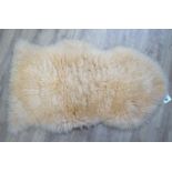 A SHEEPSKIN RUG