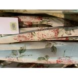 A SET OF FIVE LINED AND INTERLINED FLORAL CURTAINS