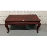 A CHINESE RED LACQUERED RECTANGULAR COFFEE TABLE