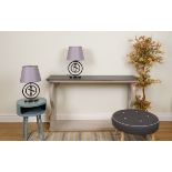 LIGHTING, A PAIR OF BLACK METAL TABLE LAMPS FORMED AS CIRCLES WITH TAPERING GREY SHADES