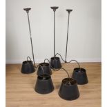 A SET OF THREE PATINATED METAL TWIN LIGHT HANGING LIGHTS (3)