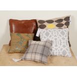 CUSHIONS, A GROUP OF FIVE CUSHIONS OF VARIOUS DESIGNS (5)