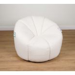 A LARGE CREAM WOOL UPHOLSTERED CHAIR