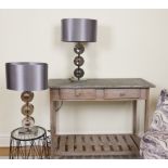 LIGHTING, A PAIR OF SMOKY GLASS TABLE LAMPS WITH GREY SILK SHADES