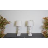 A PAIR OF MARBLE LAMP BASES FORMED AS ABSTRACT LADIES (2)