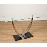 A CHROME AND GLASS SIDE TABLE