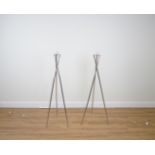 A PAIR OF CHROMED TRIPOD STANDARD LAMPS (2)