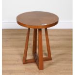 AN OAK CIRCULAR OCCASIONAL TABLE ON FOUR SHAPED SUPPORTS (2)