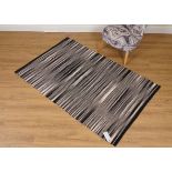 HABITAT, TWO BLACK AND WHITE FLATWEAVE RUGS (2)