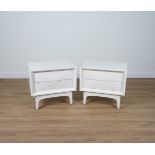 A PAIR OF WHITE TWO DRAWER BEDSIDE CHESTS WITH GEOMETRIC DRAWERS (2)